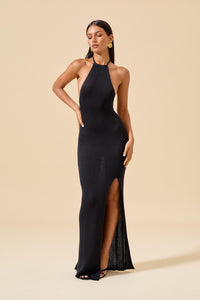 flook the label nyota dress black maxi halter neck open back thigh split front